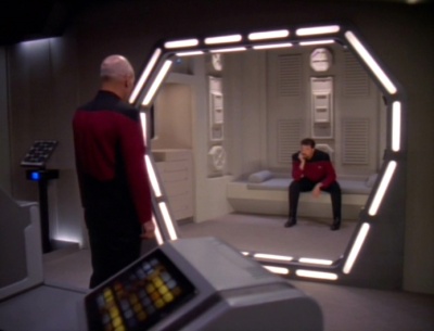 Picard standing in front of the brig containing Riker in the ST:TNG episode 'The Pegasus'