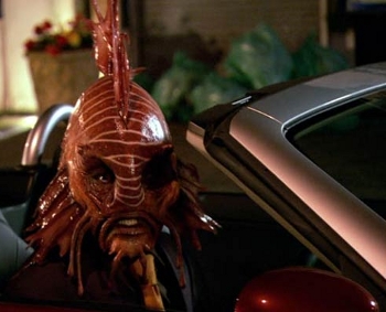 Blowfish in a sports car from the Torchwood episode "Kiss Kiss, Bang Bang"
