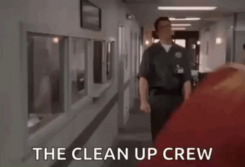 Glen Matthews (AKA Janitor) in the TV series Scrubs making a 'represent' gesture with the caption 'The Clean Up Crew'