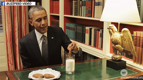 Former US president Barack Obama failing to dunk a large cookie into a glass of milk before saying, 'Thanks Obama.'