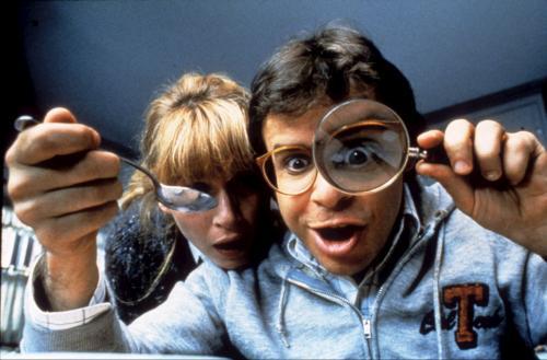 Rick Moranis with a magnifying glass near the end of 'Honey I Shrunk the Kids'